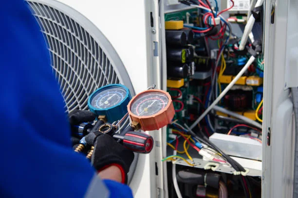 HVAC diagnostic gauges and wiring used to test system controls and performance
